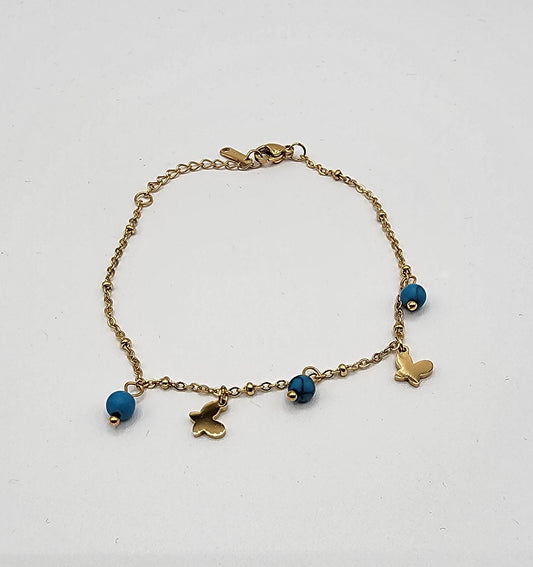 Adjustable golden stainless steel anklet bracelet with two Butterfly Charms and 3 turquoise beads