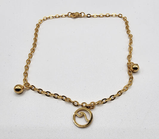 Golden stainless steel anklet bracelet with a wave charm and 2 beads pendants