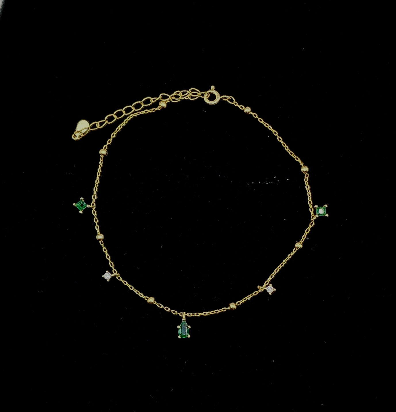 Gold plated 925 sterling silver anklet with green and clear crystals