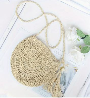 Round woven crossbody bag with tassel and wooden bead