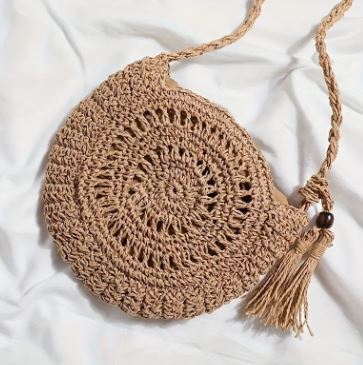 Round woven crossbody bag with tassel and wooden bead