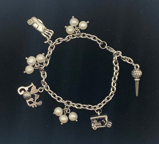 Adjustable stainless steel bracelet with freshwater pearls and golf charms