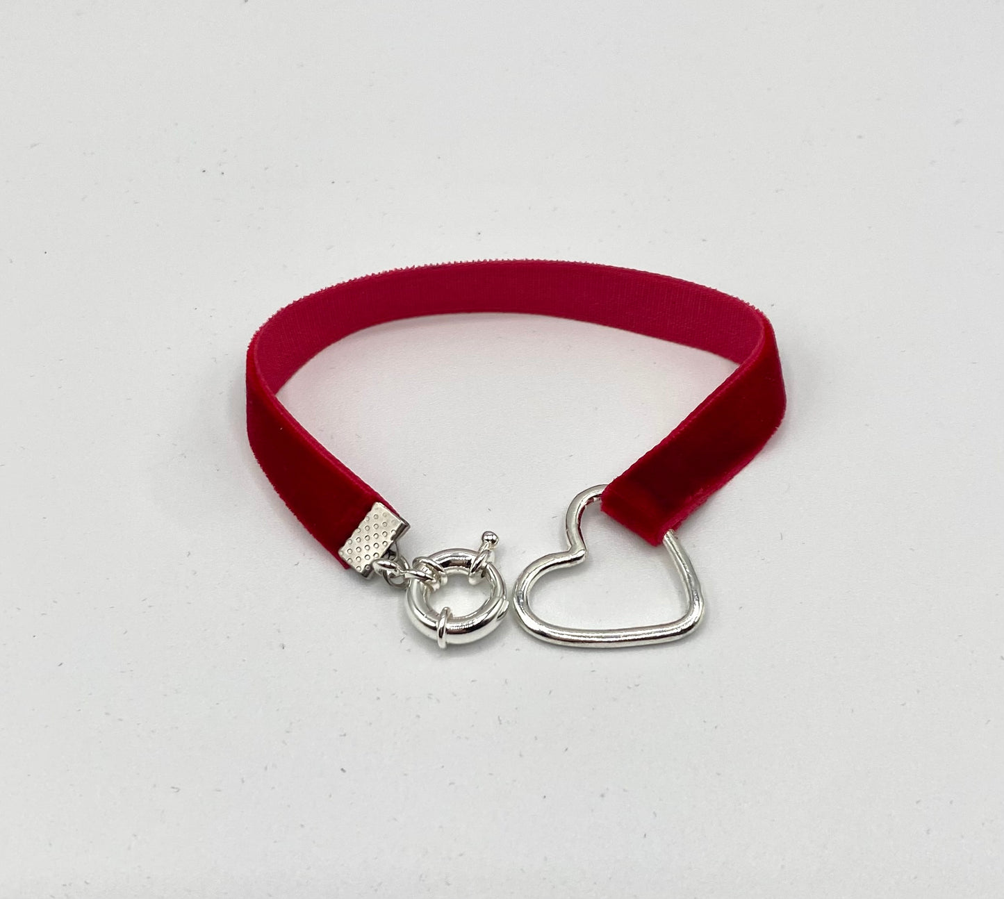 Red velvet ribbon bracelet with sterling silver heart charm