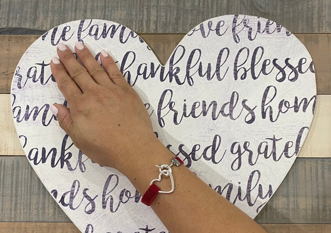 Red velvet ribbon bracelet with sterling silver heart charm