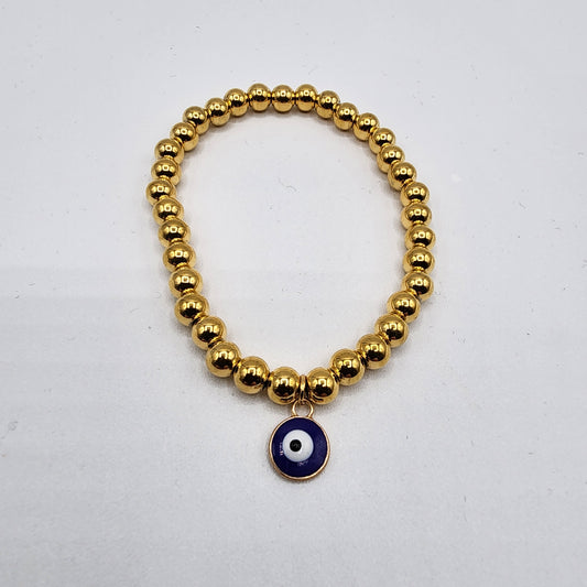 Nylon bracelet with 6 mm golden stainless steel beads and blue evil eye charm