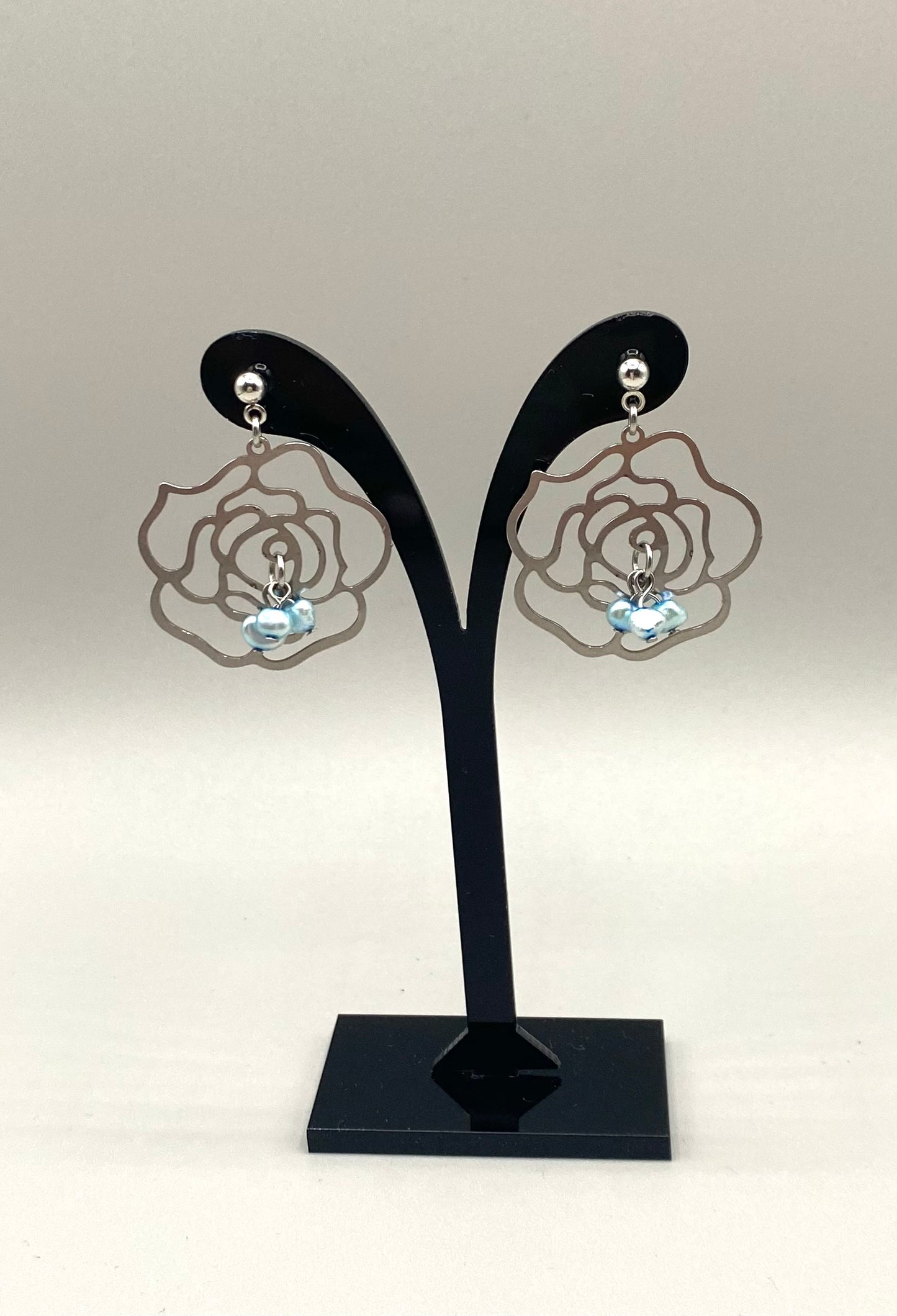 Stainless steel earrings with rose charm and freshwater pearl bead