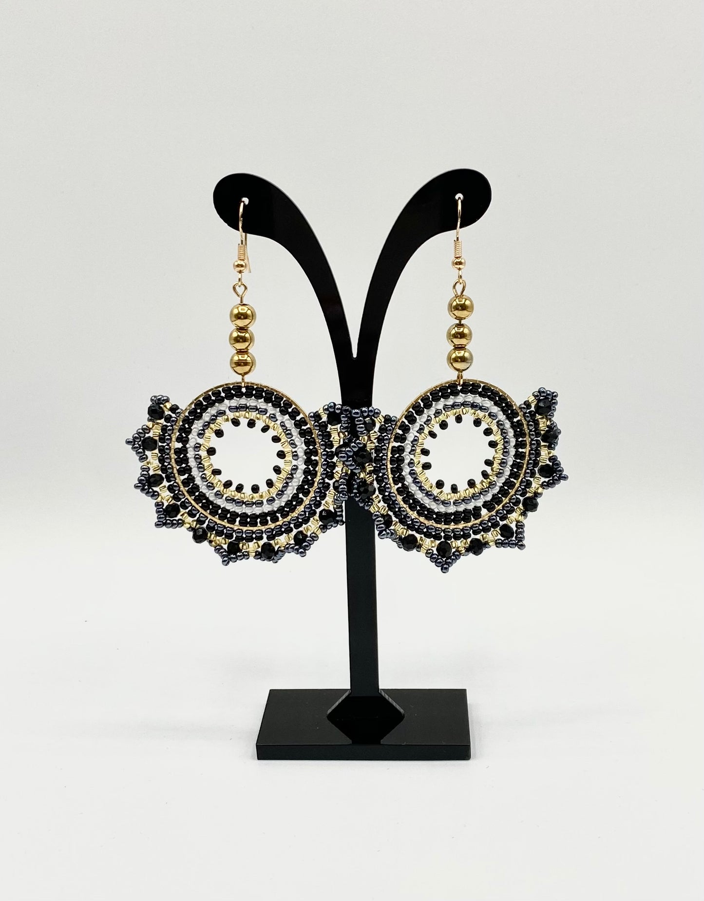 Round with geometric edge earrings with gold plated beads