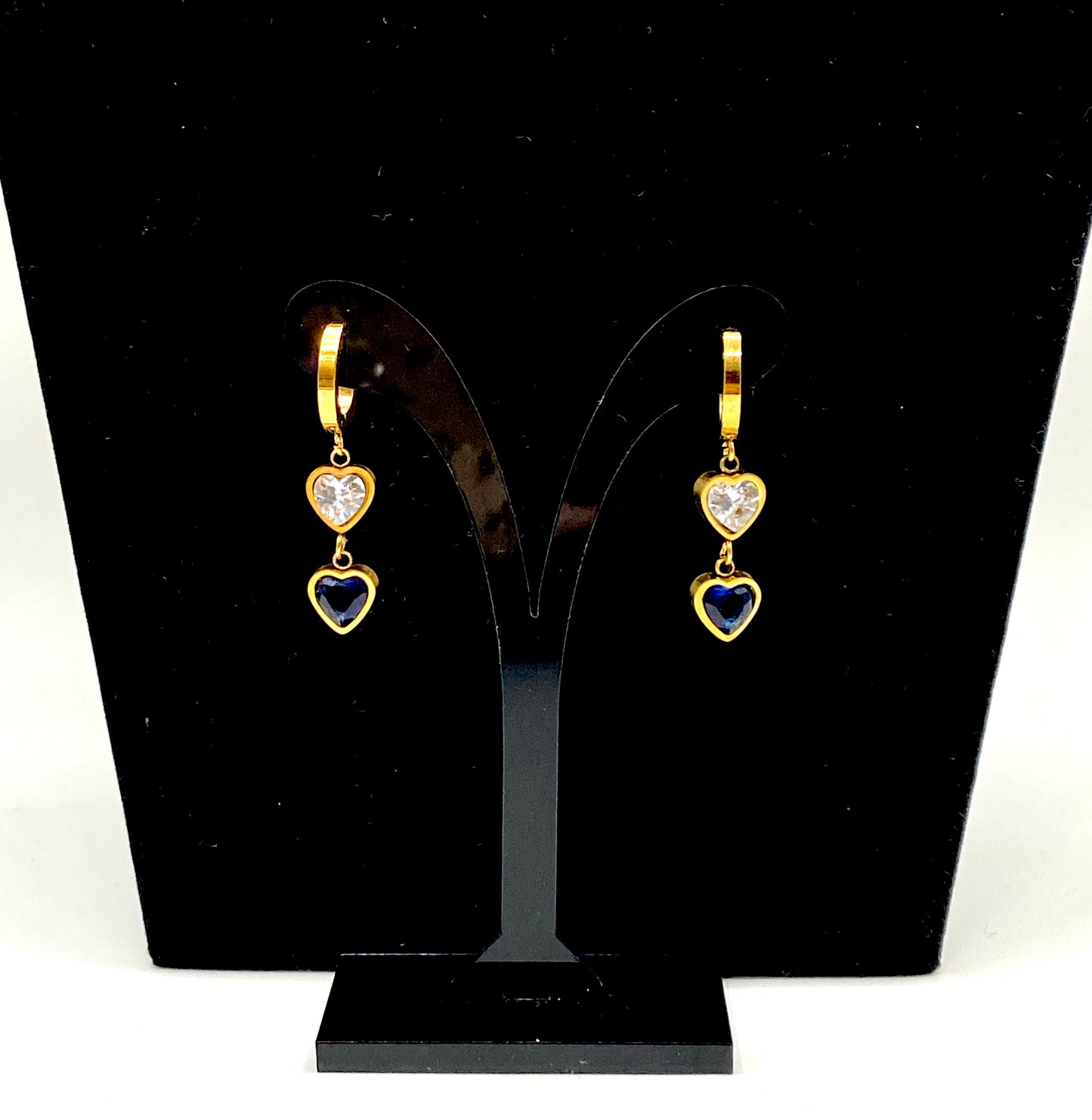 Golden stainless steel hoop earrings with blue and clear crystal hearts