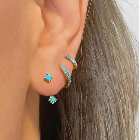 Set of three 14K gold plated copper earrings with turquoise colored stones.