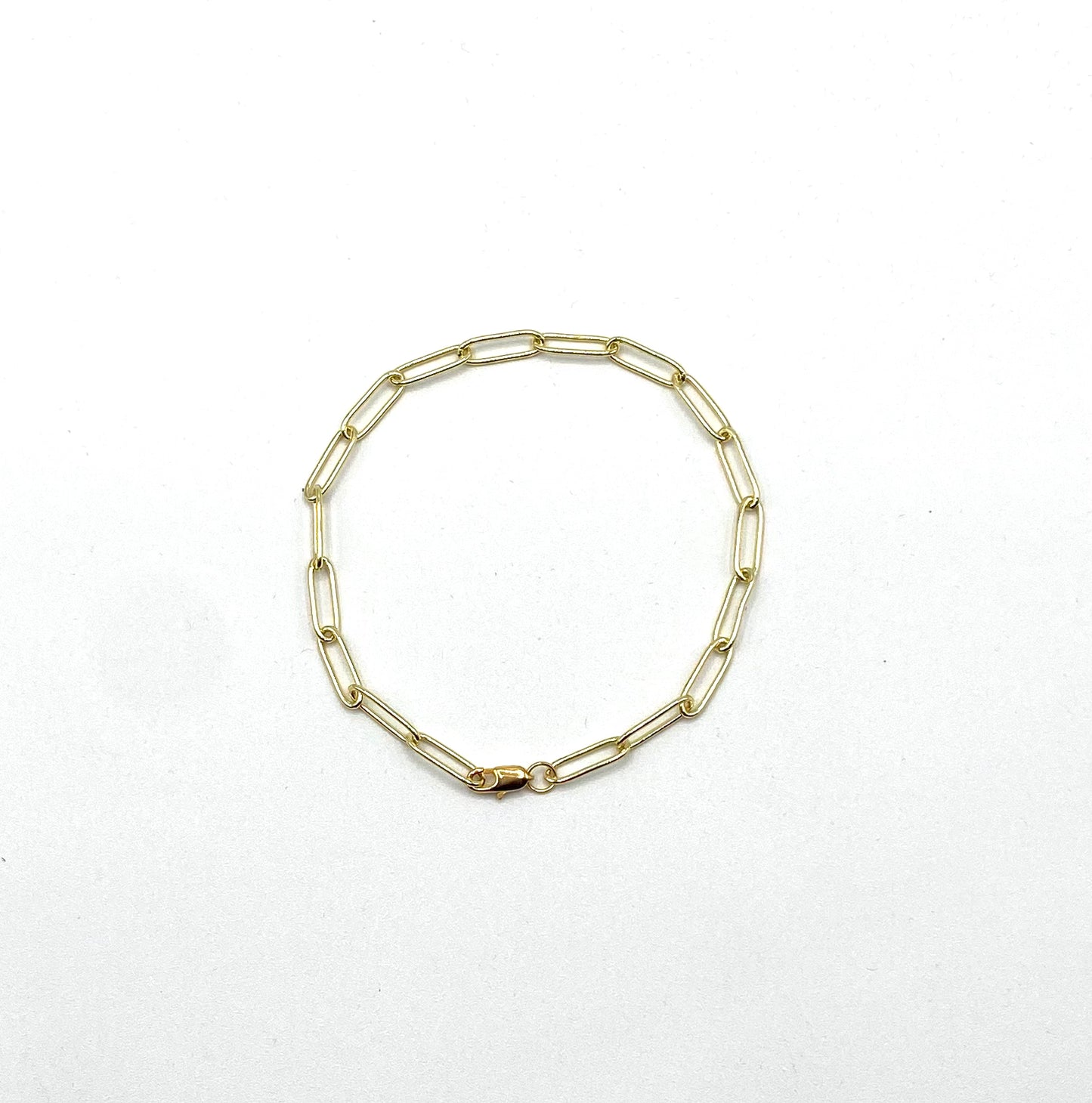 Adjustable up to 22 cms paper clip 14 K gold plated bracelet