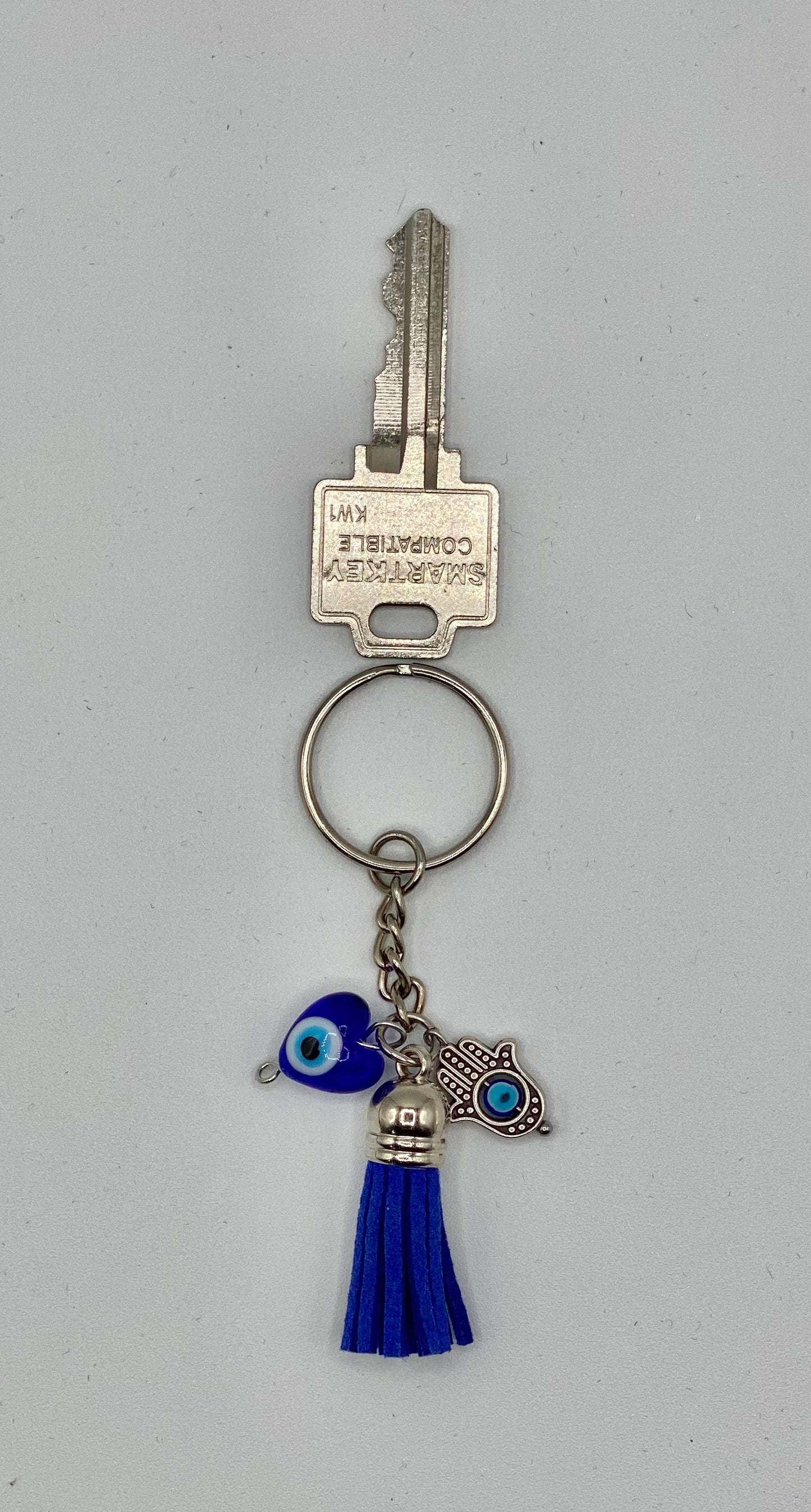 Key holder with blue tassels with HAMSA Hand and Heart Evil Eye glass charms