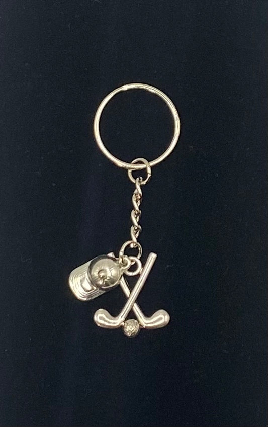 Key holder with golf cap, clubs and ball charms