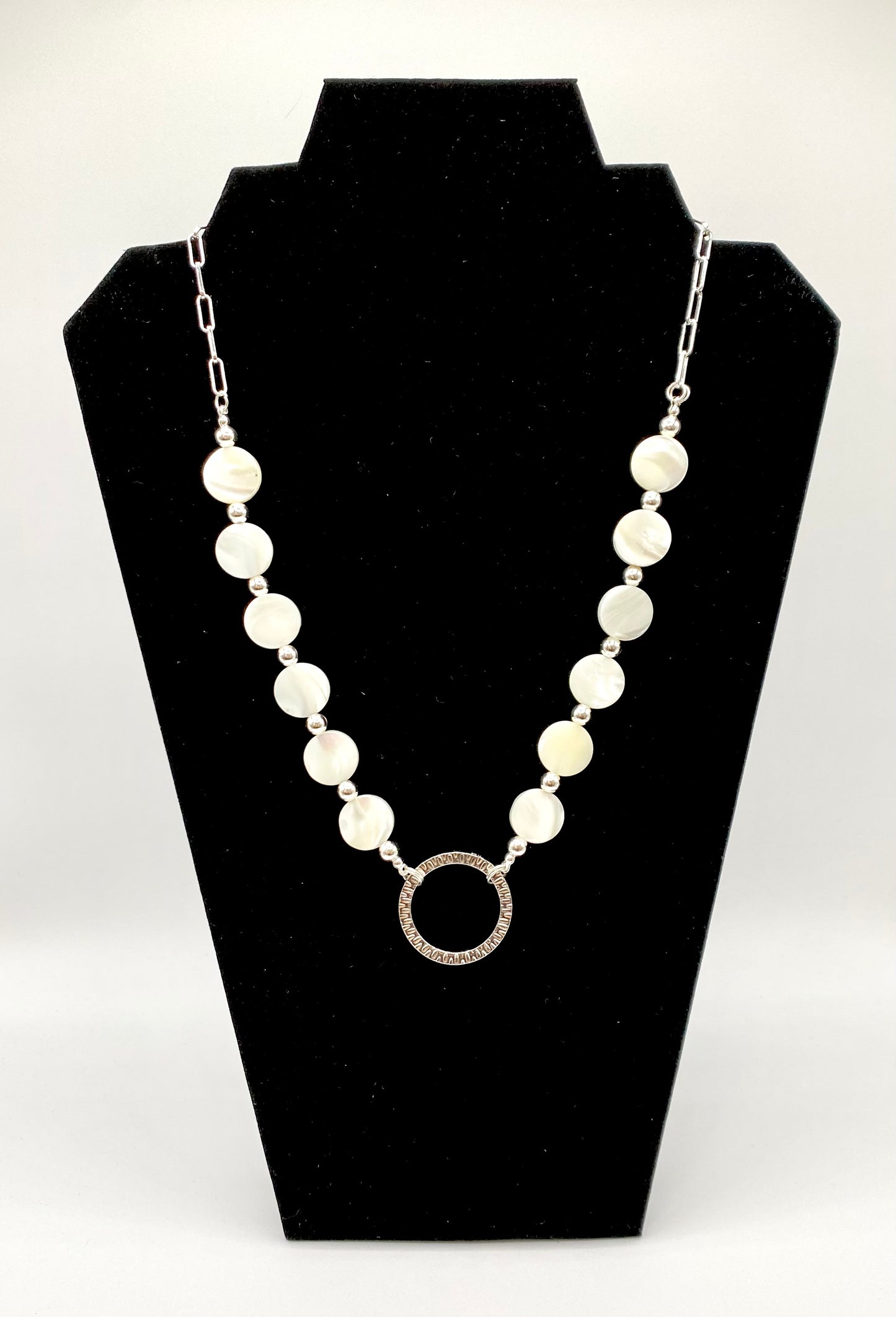 Round shells necklace with silver plated beads and circle Rhodium pendant