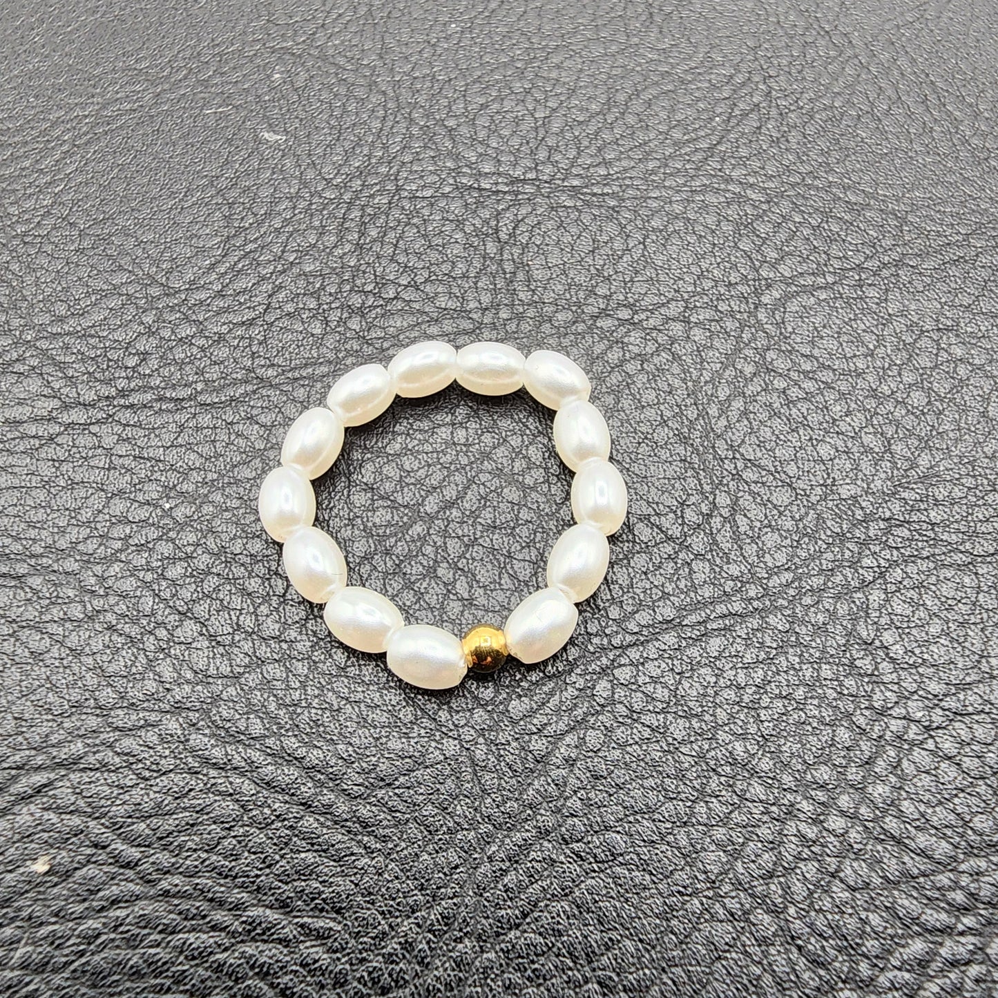 White mini faux pearls ring with golden stainless steel bead