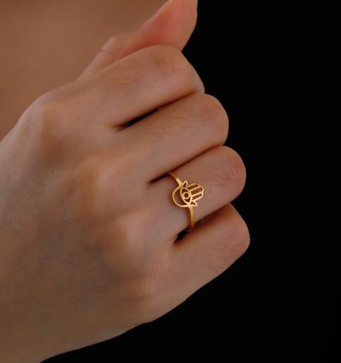 Trendy golden stainless steel ring with Hamsa Hand and Evil Eye