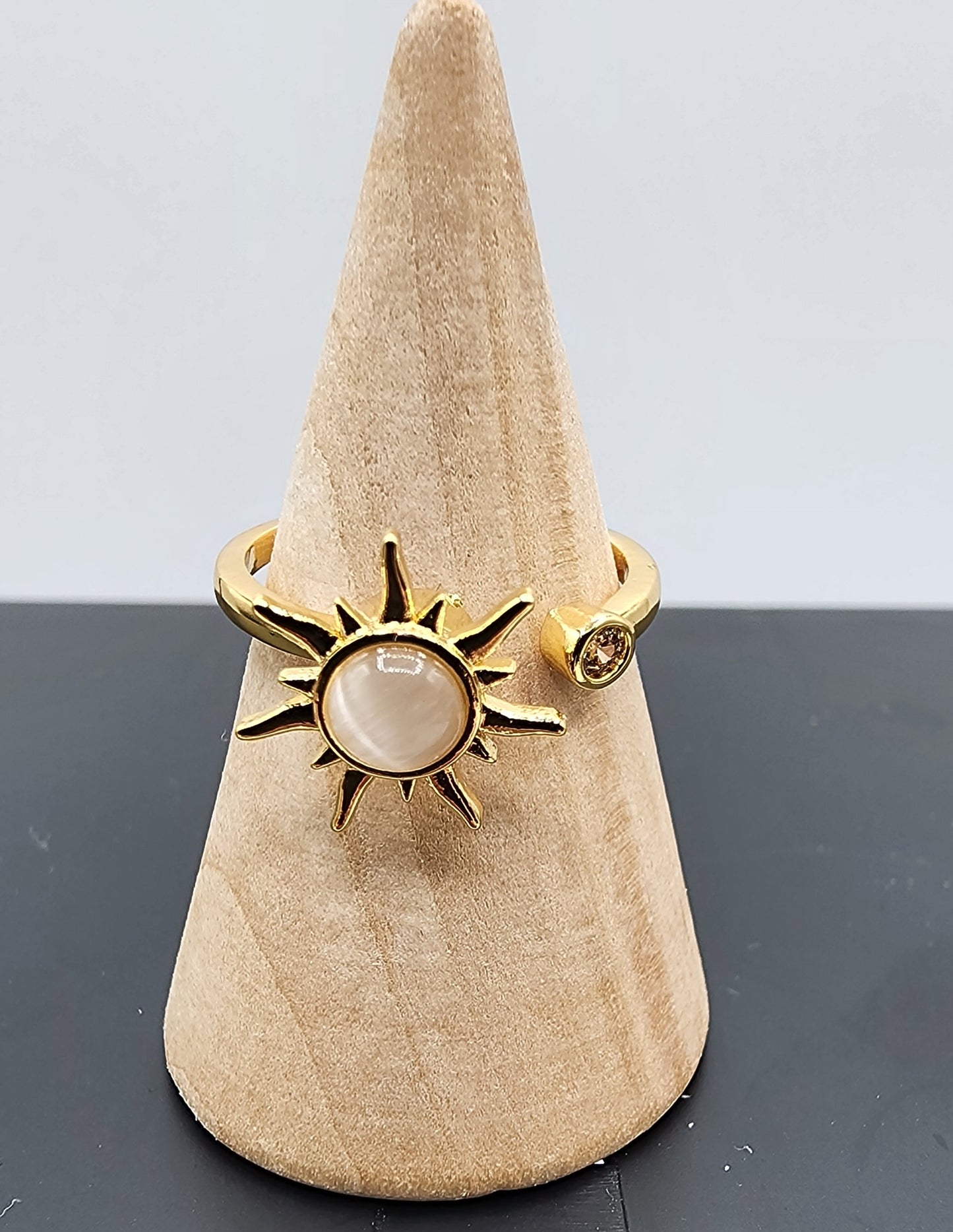 Adjustable 18k gold plated copper opal sun fidget, spinner and anti stress ring. Nickel free.