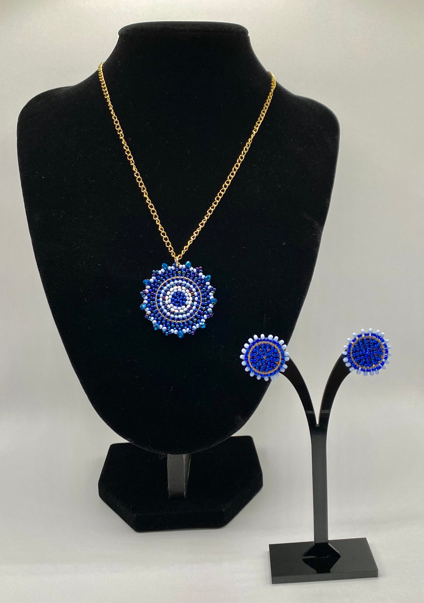 Round beaded earrings with stainless steel necklace with round beaded pendant