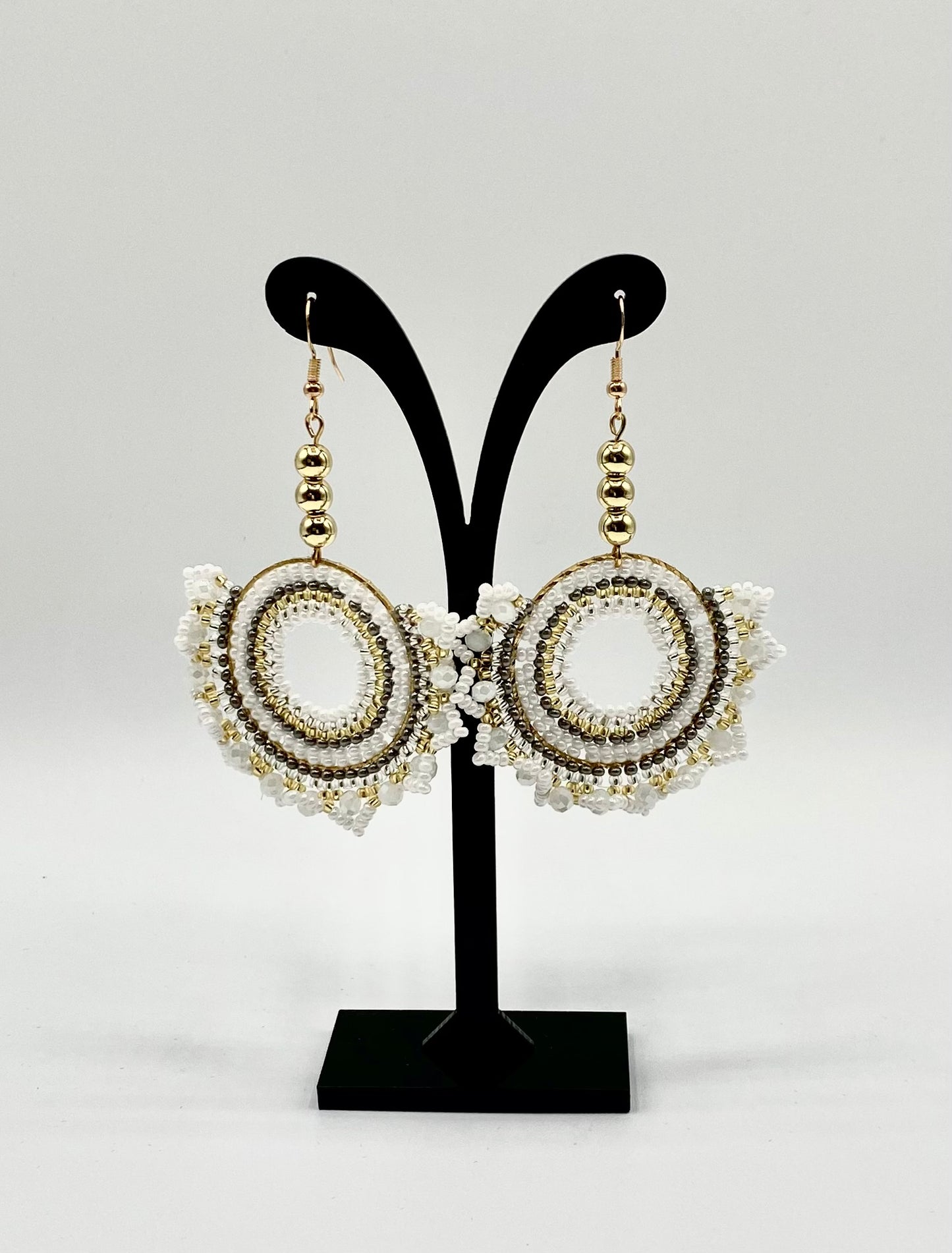 Round with geometric edge earrings with gold plated beads