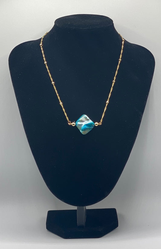 Gold plated necklace with blue shell charm