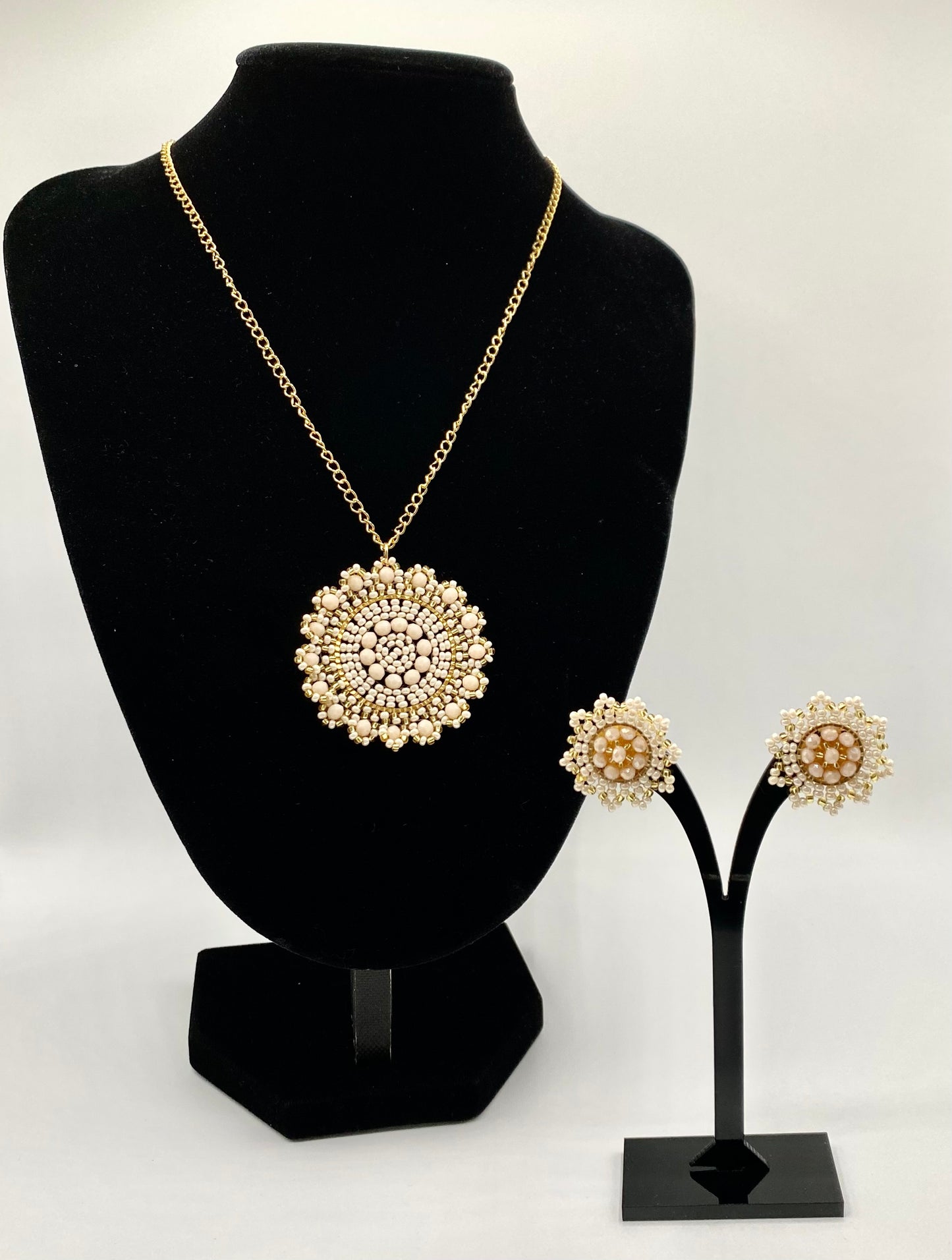 Round hand made earrings and gold plated necklace set with beads